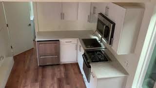 Big Gorgeous Tiny House Tour 10 x 30 Kinderhook has a sleeping loft washerdryer full kitchen [upl. by Petulah]