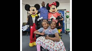 Mickey and Minnie visit conjoined twins Marieme and Ndeye on their 8th birthday in Cardiff today 😊 [upl. by Ahseinek]