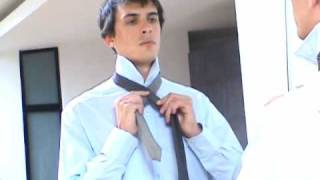 How to tie a tie The Half Windsor [upl. by Nido]