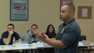 Police officers take course teaching deescalation techniques [upl. by Nollaf]