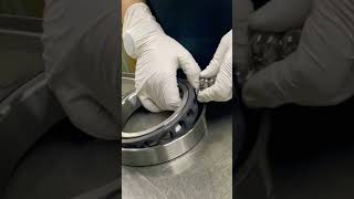 The bearing installation process requires precision and care [upl. by Ajna]