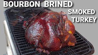 Smoked Turkey on a PK Grill  Bourbon Brined Smoked Turkey [upl. by Ahtamas625]