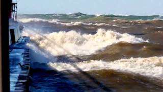 Great Lakes Storm of 2010  Grand Haven channel quotgotchaquot wave [upl. by Blakeley508]