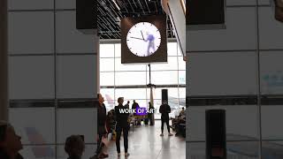 Man in the clock  Amsterdam Airport Schiphol [upl. by Arabelle218]