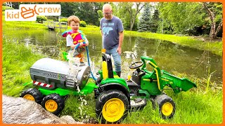 Watering crops and fertilizing with kids tractor on the farm Educational how pumps work  Kid Crew [upl. by Saxela724]