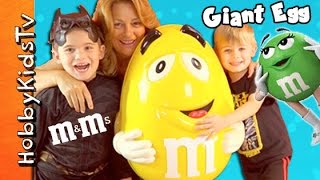 Giant M EGG with TOY SURPRISES Inside by HobbyKidsTV [upl. by Nrubyar]