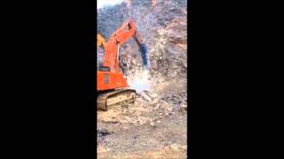 HYDRAULIC BREAKER  HAMMER HS 4500 IN CHINA IRONSTONE QUARRY [upl. by Thurman]