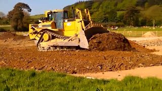 CAT D8 dozer at work pushing gravel for road construction [upl. by Tega336]