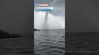 Florida Waterspout Comes On Shore As Tornado Lofts Debris Into Air [upl. by Cressi366]