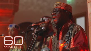 Gnawa music legacy of enslaved Black Africans surges in popularity  60 Minutes [upl. by Einahpet625]