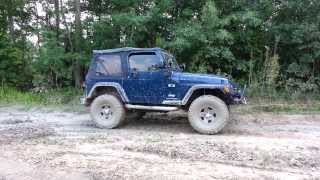 Jeep TJ 4WD vs 2WD vs small mud hole [upl. by Artemis]