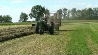 Baling hay with a John Deere 630 tractor and 336 baler [upl. by Phillis]