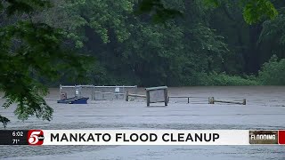 Mankato residents dump debris from flooddamaged basements City prepares for more rain [upl. by Zanlog]