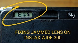 Fixing jammed lens on FujiFilm Instax Wide 300 [upl. by Enicar]