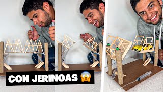 ¿Como hacer un puente hidraulico con jeringas Genial proyecto [upl. by Anilehs]