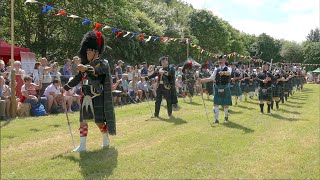 Farewell to the Creeks as Drum Major leads massed bands march during 2023 Drumtochty Highland Games [upl. by Ruford]