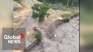 BC landslide Structure washed away after water tops Chilcotin River site video shows [upl. by Adnima431]