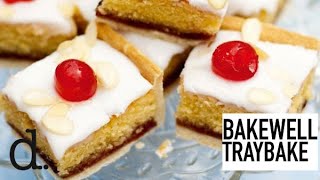 Iced Bakewell Tart Tray Bake  delicious Magazine [upl. by Ognimod182]