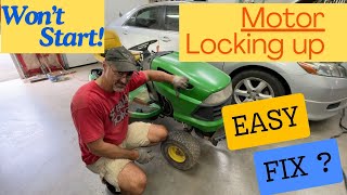 LA120 John Deere Lawn Tractor mower DEAD Can it be saved Vtwin Briggs Motor locking up Wont run [upl. by Gausman]