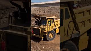 Truck CAT 769 C working drive on dirt caterpillar dumpertruck [upl. by Nirrat391]