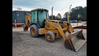 Lumber Yard Grading With The Backhoe [upl. by Nanyk]