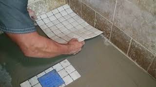 Mosaic tile installation in shower by tile man mike [upl. by Ahlgren]