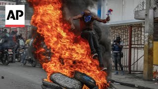 Protesters in Haiti demand resignation of Prime Minister Ariel Henry [upl. by Ariayek476]