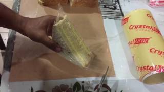 Fastest and easiest way how to wrap a sandwich using a plastic wrapper bungkus sandwich [upl. by Kerman70]