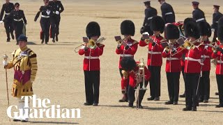 Soldier faints during trooping the colour rehearsal in London heatwave [upl. by Novelc842]