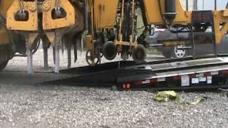 TRAILEZE Trailers TE100FGRR loading Jackson 6700 Tamper [upl. by Sarat804]