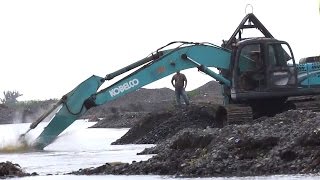 Kobelco SK200 Excavator Dredging Lading Dump Trucks [upl. by Shurlocke353]