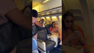 Lady is rude to another passenger and gets kicked off the flight 😱 [upl. by Ahsirahc]