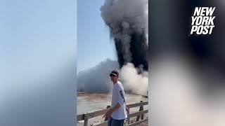 Jawdropping video shows Yellowstone geyser explode sending tourists fleeing in terror [upl. by Gladis]