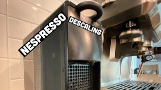 How to Descale Nespresso Mini [upl. by Letsirc650]