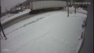 Security video captures semitruck jackknifing during winter weather [upl. by Innavoeg531]