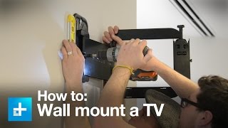 How to wall mount a TV with the Sanus full motion VMF322B1 [upl. by Constantina]