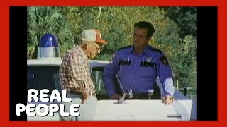 Carrabelle Florida and Its OneStop Cop  Real People  George Schlatter [upl. by Noak]