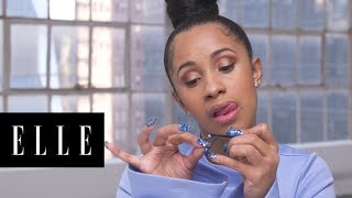 Watch Cardi Bs 90 Second Makeup Routine  ELLE [upl. by Enylorac]