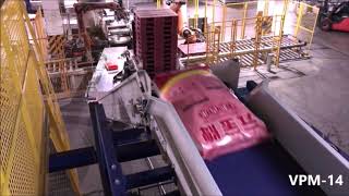 Palletizing  Automatic Palletizer machine VPM14 by Verbruggen  stacking 25kg plastic bags of rice [upl. by Dorolisa]