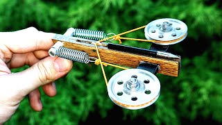 Making a Mini Compound Crossbow with Springs [upl. by Irahs]