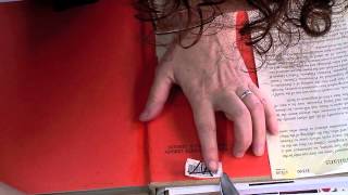 Remove a Library Barcode Sticker with a Book Repair Knife [upl. by Anivol233]