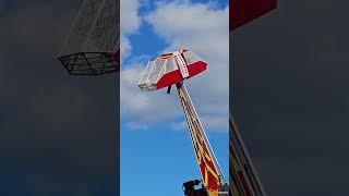 Carnival ride operator left dangling in the air after strong winds sent ride car into air Shorts [upl. by Ocer]