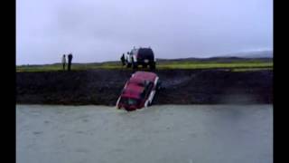 Nissan Patrol y61 bigfoot crossing a glacial river in Iceland [upl. by Ycinuq781]