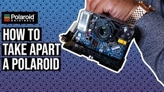 How To Take Apart a Polaroid  One Step 2 [upl. by Iborian996]