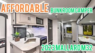 BUNKHOUSE On a BUDGET  2023 Mallard M32 Walkthrough  Affordable Camping for the Whole Family [upl. by Annig768]