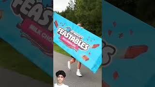 Running with biggest feastables🤯🥶 mrbeast shorts shortvideo [upl. by Nohsar146]