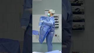 How to Don Sterile Gowns and Gloves in the Operating Room meded surgeon surgtech operatingroom [upl. by Aynatan]