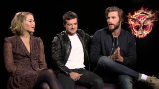 Watch Jennifer Lawrence Josh Hutcherson and Liam Hemsworth Play “Save or Kill” [upl. by Anilejna354]