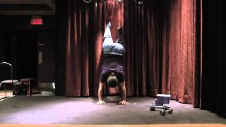 Convict ConditioningStep 8Half Handstand Pushups [upl. by Kemeny330]