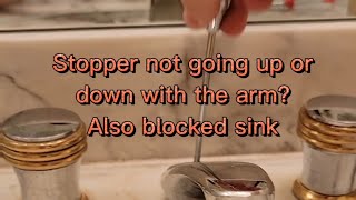 How to reconnect a bathroom sink stopper and clean the drain [upl. by Ahsilla851]